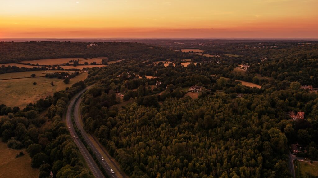 a road going through countryside from above