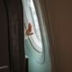 baby's hand on inside of aeroplane window